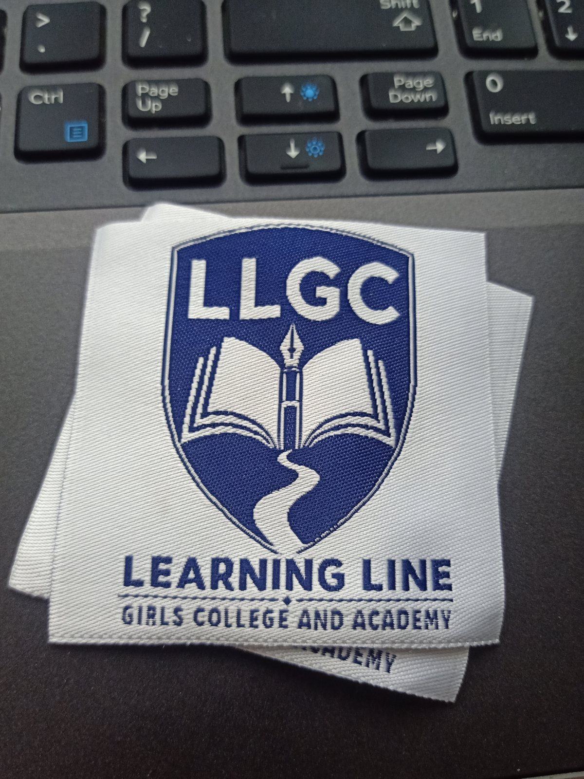 Real woven school monograms & badges example